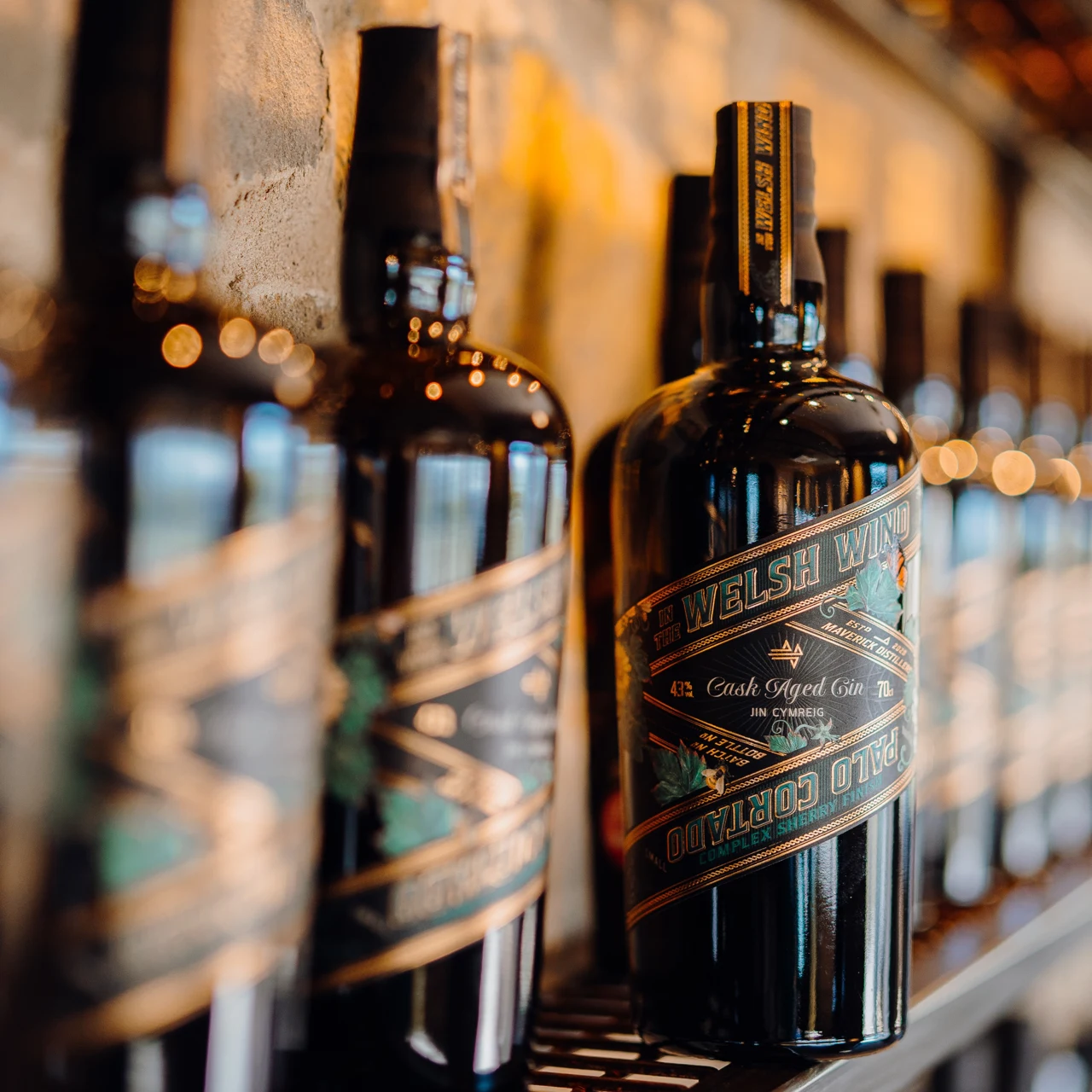 In the Welsh Wind bottles displayed on shelves.
